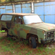 Illustration for article titled This Abandoned Soviet Sub Base Is Hiding Amazing Army Truck Barn Finds